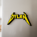 Custom Metallica fridge magnet with the name "Dylan"