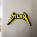 Custom Metallica fridge magnet with the name "Dylan"