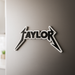 Custom Metallica fridge magnet with the name "Taylor"