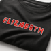 Custom Black Iron Maiden t-shirt with 'ELIZABETH' printed in red on a white background