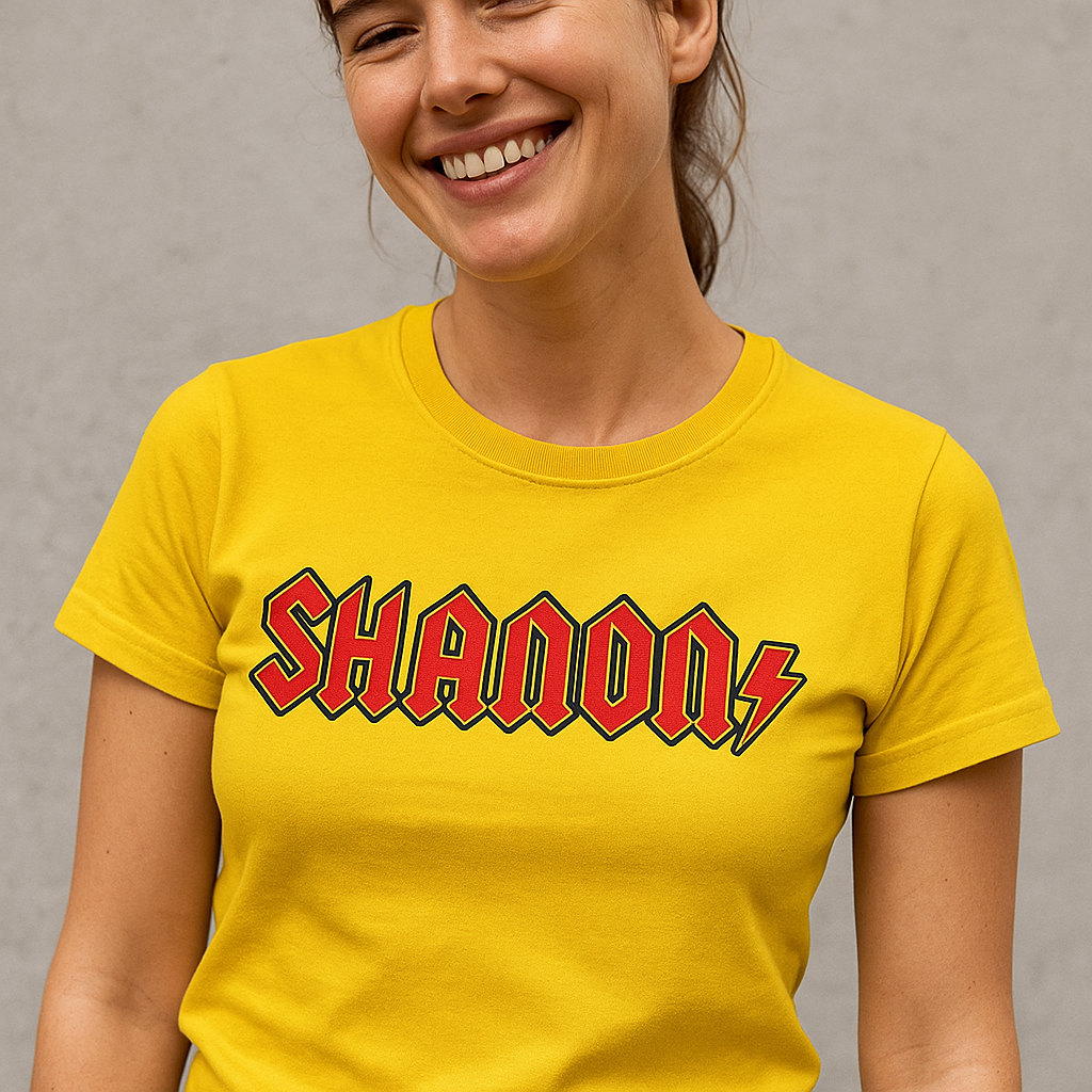 Woman wearing a custom yellow ACDC t-shirt with 'SHANON' printed on it against a plain background