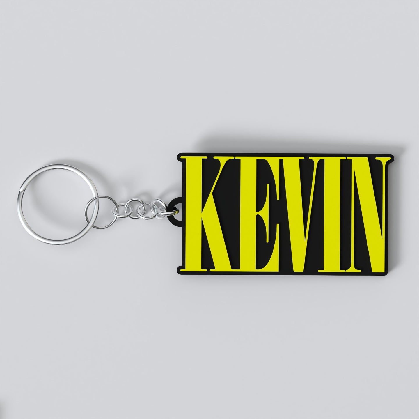 Custom Nirvana keychain with the name "KEVIN"