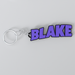 A custom Black Sabbath keychain with the name Blake printed in purple on a white background.