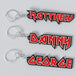 Custom Iron Maiden keychains with different names printed in a stylized font resembling a metal band logo.
