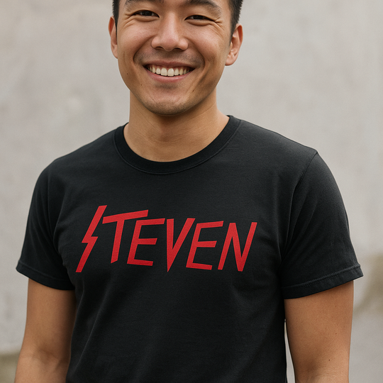 Man wearing a custom Slayer black t-shirt with red text 'STEVEN' against a neutral background