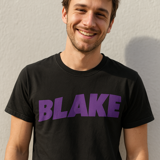 Man wearing a Custom Black Sabbath t-shirt with 'BLAKE' in purple letters against a plain background