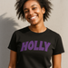 Woman wearing a Custom Black Sabbath t-shirt with 'HOLLY' printed in purple on a neutral background