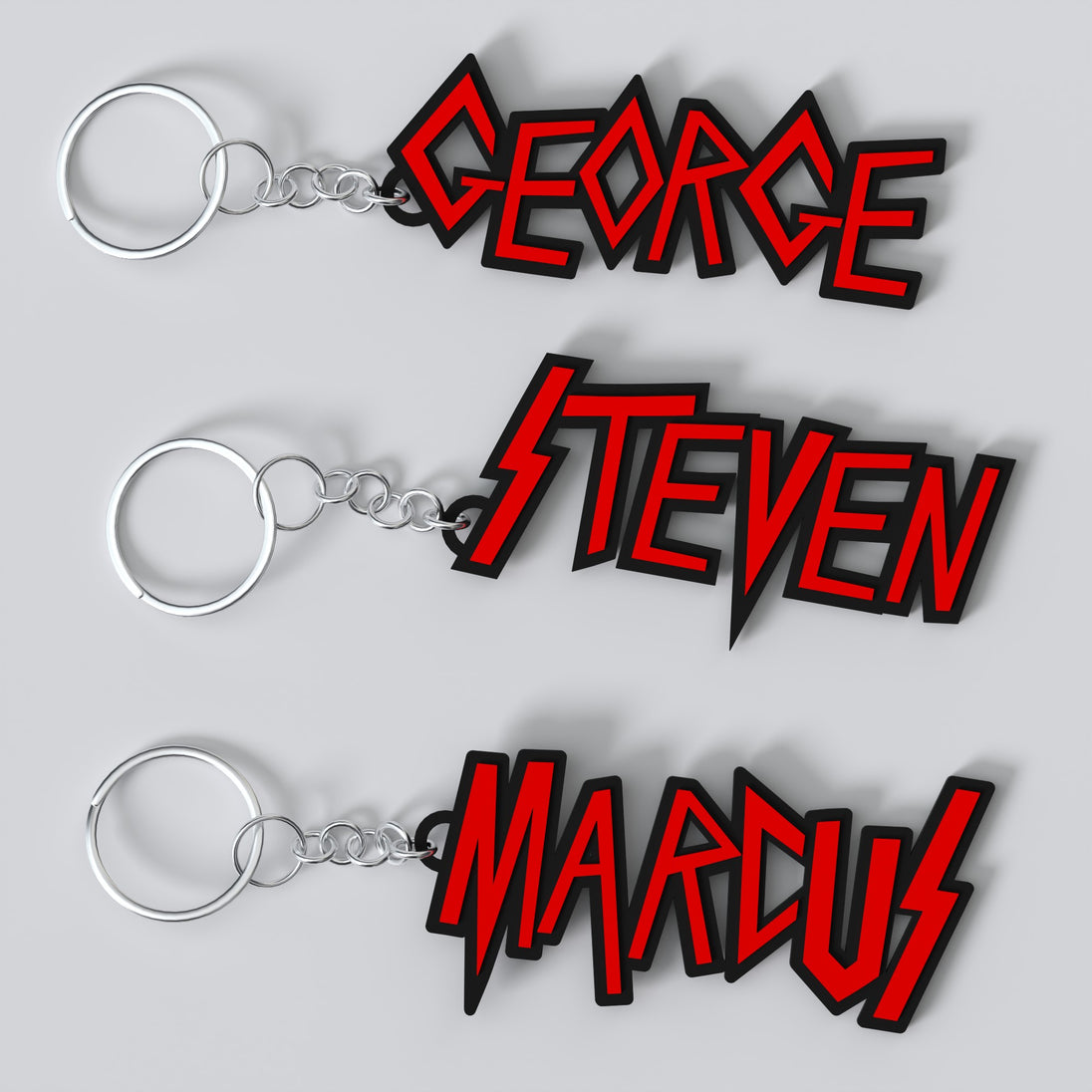 Custom Slayer keychains with the names 'GEORGE', "STEVEN" AND "MARCUS".