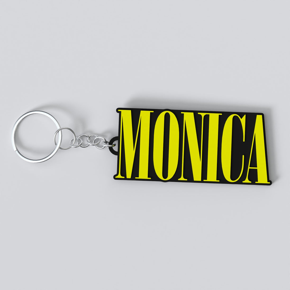 Custom Nirvana keychain with the name "MONICA"