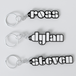 Three custom The Doors keychains with the names 'ross', 'dylan', and 'steven' printed on them, each keychain is black with a white outline of the name and a silver keyring.