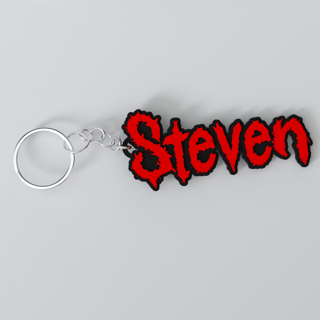 Customized Slipknot keychain with the names 'Steven'.