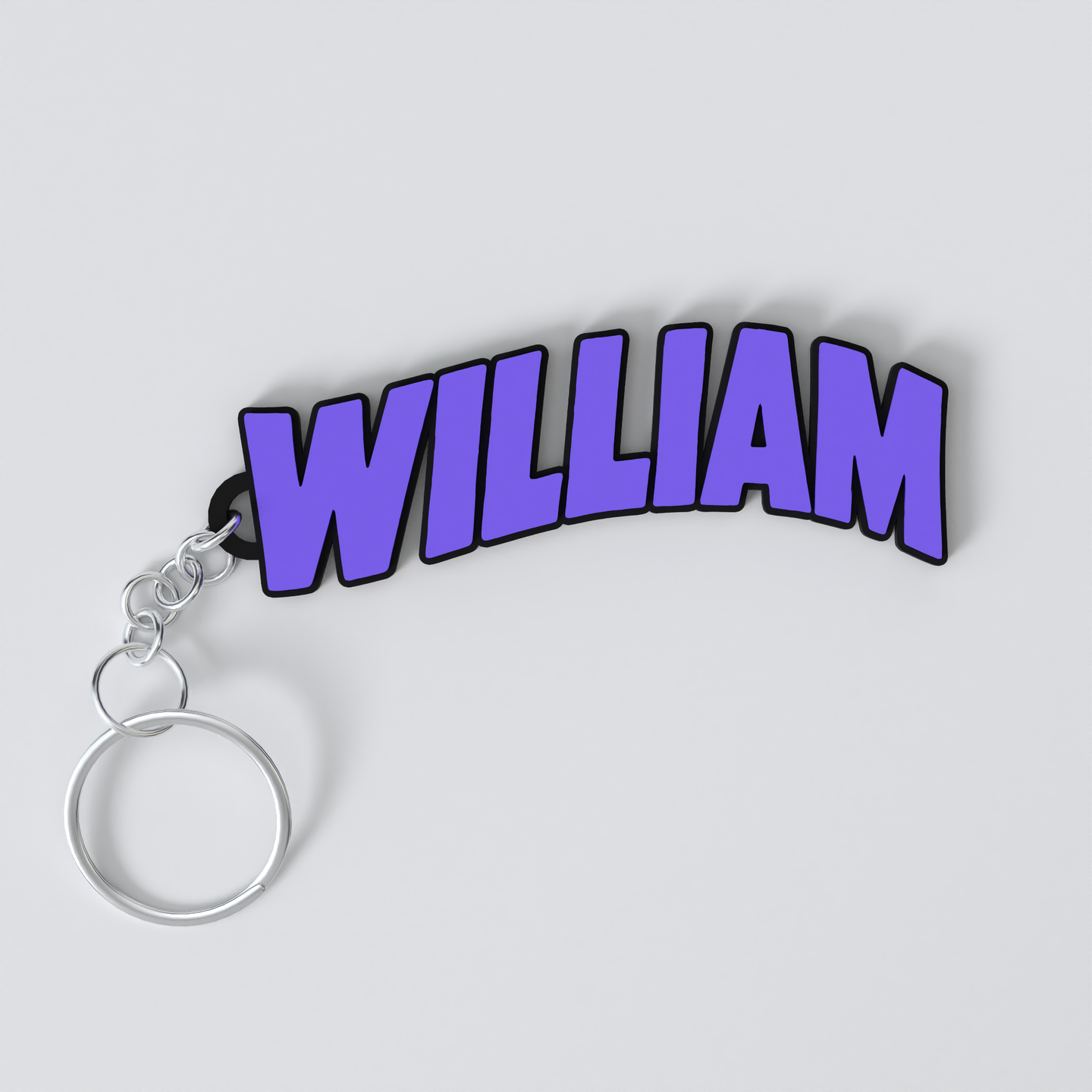 A custom Black Sabbath keychain with the name WILLIAM printed in purple on a white background.