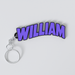 A custom Black Sabbath keychain with the name WILLIAM printed in purple on a white background.