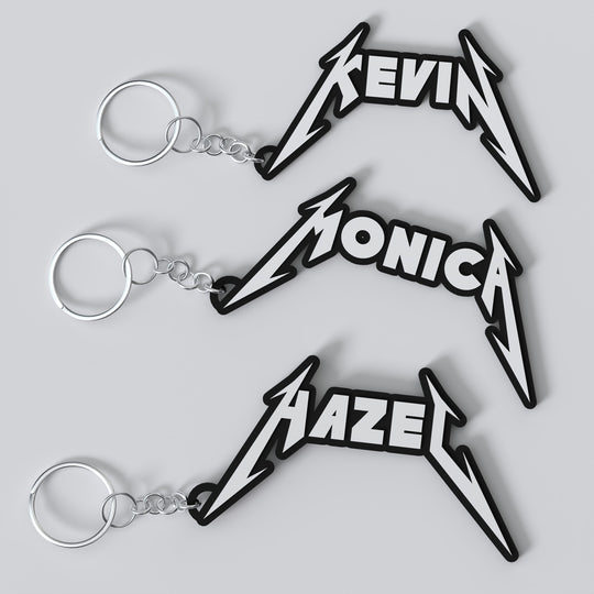 Custom Metallica keychains with personalized names, featuring a stylized metal band logo design in black and metallic finish.