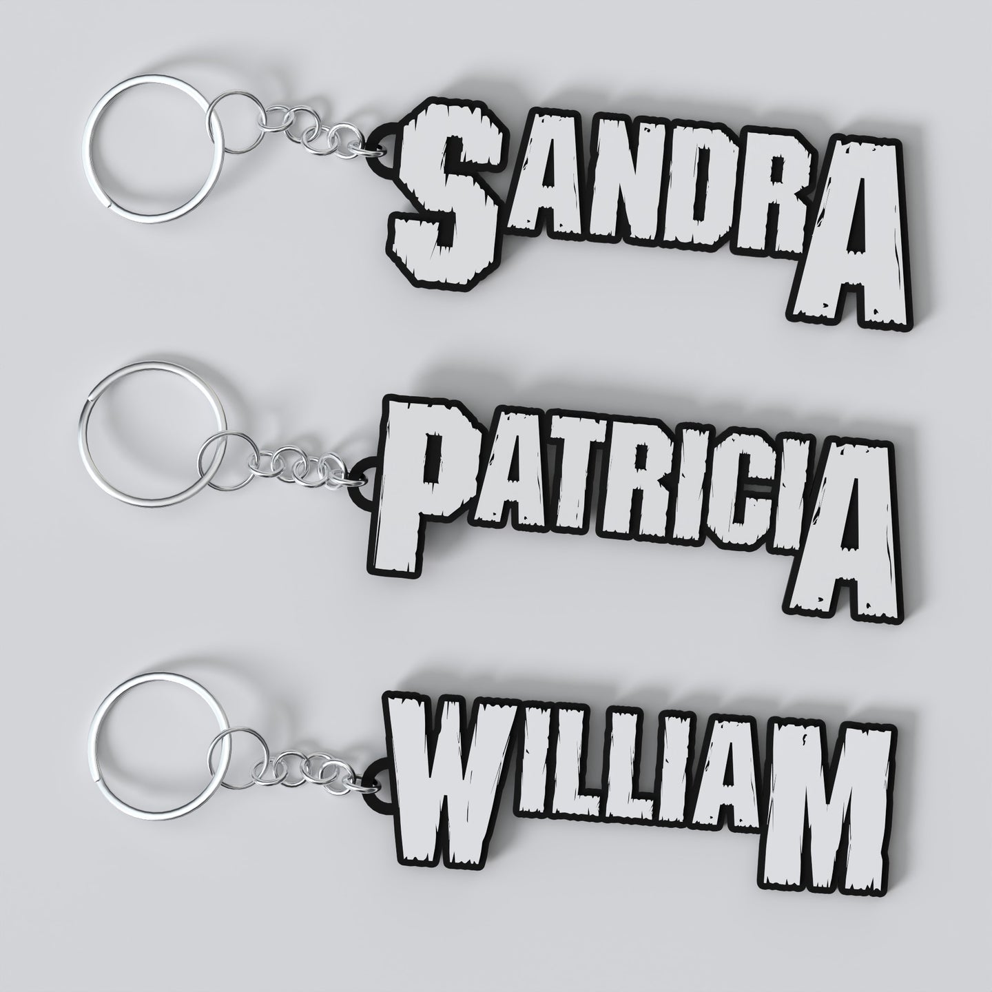 Three custom Pantera keychains with different names printed on them, displayed on a white background.